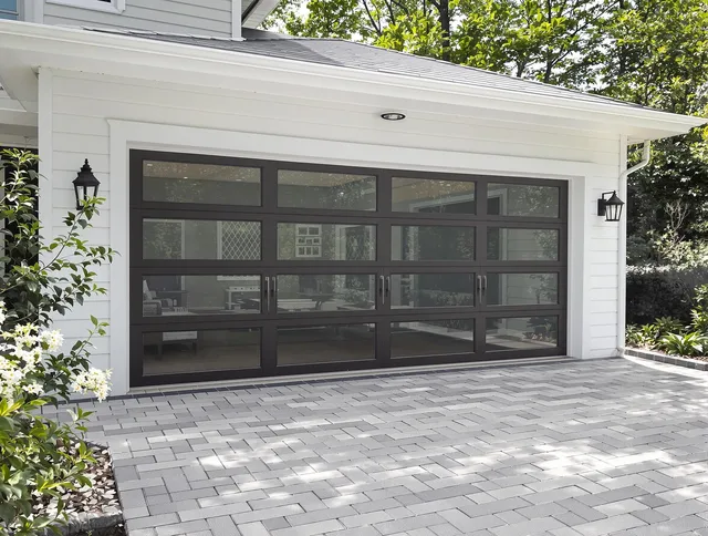 Broadview Heights Garage Door Repair design specialist presenting custom garage door options to Broadview Heights homeowner