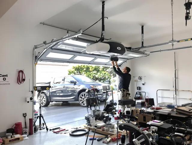 Broadview Heights Garage Door Repair specialist installing smart garage door opener system in Broadview Heights home