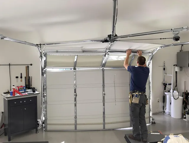 Broadview Heights Garage Door Repair specialist performing precise section replacement on Broadview Heights garage door